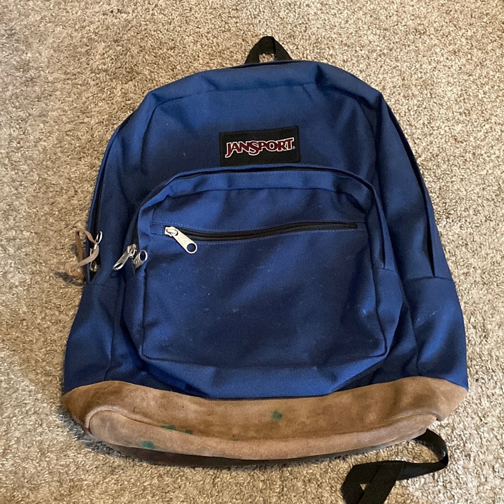 Dark blue JanSport bag, in fair condition with washable stains and good zippers!